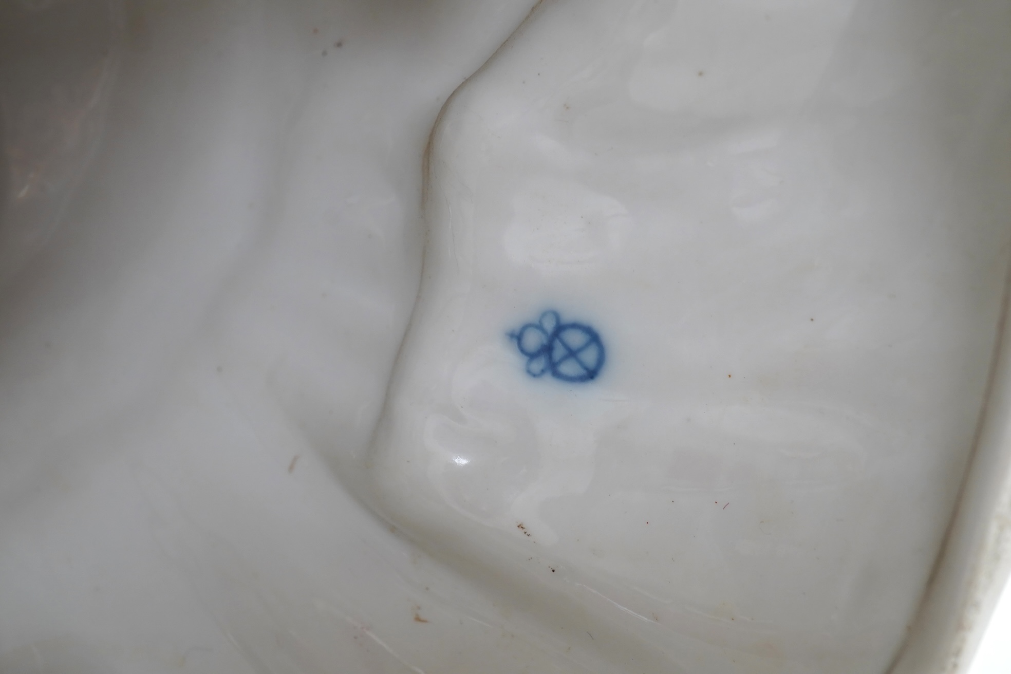 A large Continental porcelain figure of a seated nodding Buddha, early 20th century